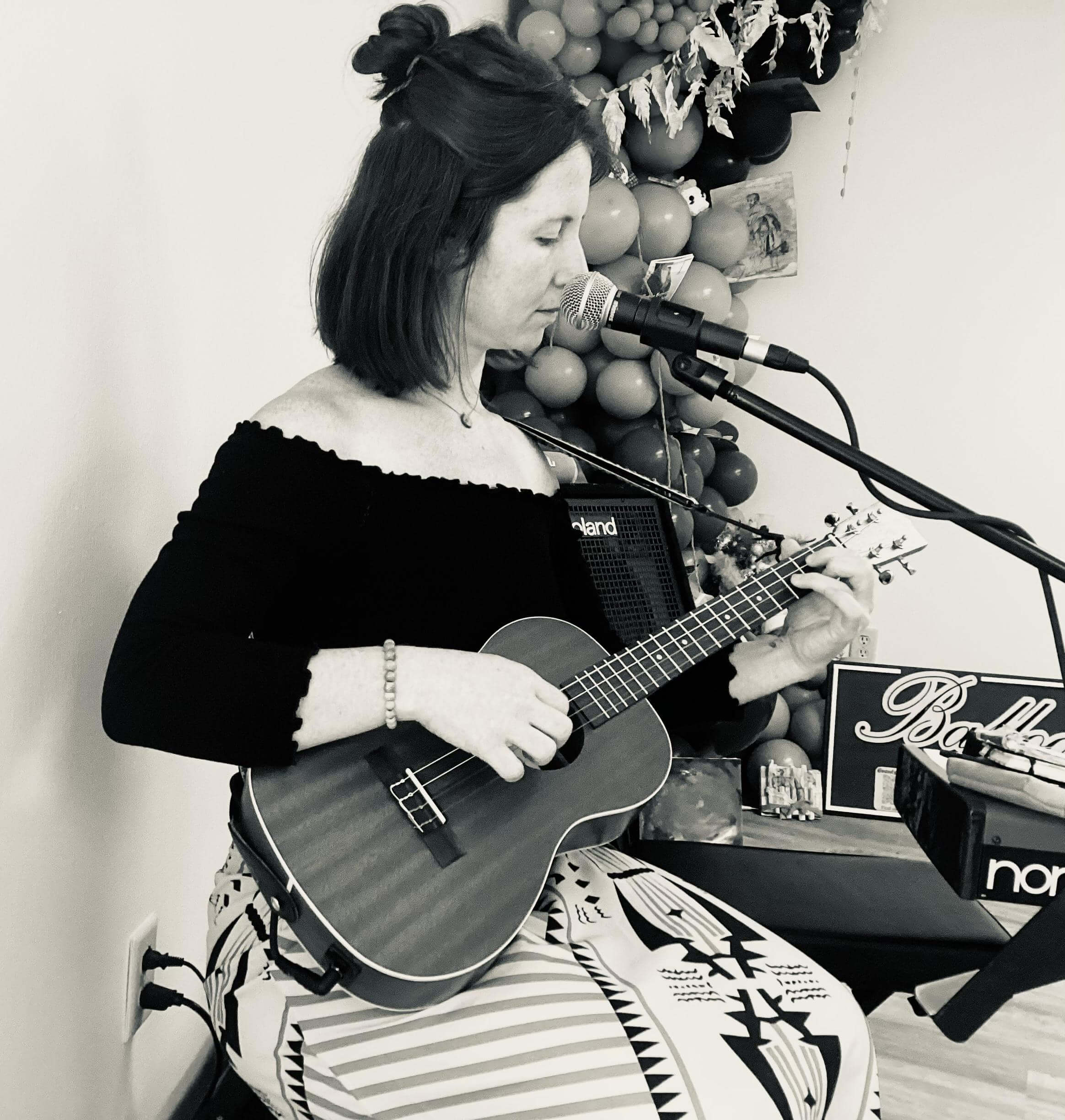 Joni Clare playing ukulele